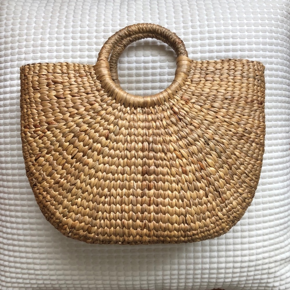 Woven straw half-moon handbag. 12in x 11in x 4in.